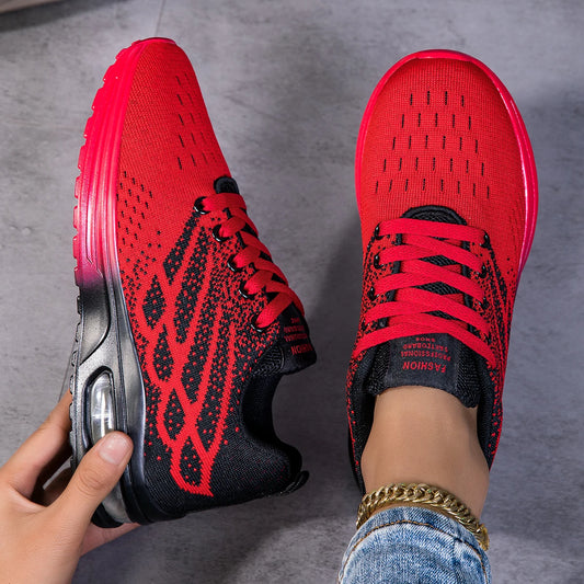 Red and black women's orthopedic sneakers with breathable air-mesh upper, lace-up closure, and rubber outsole.